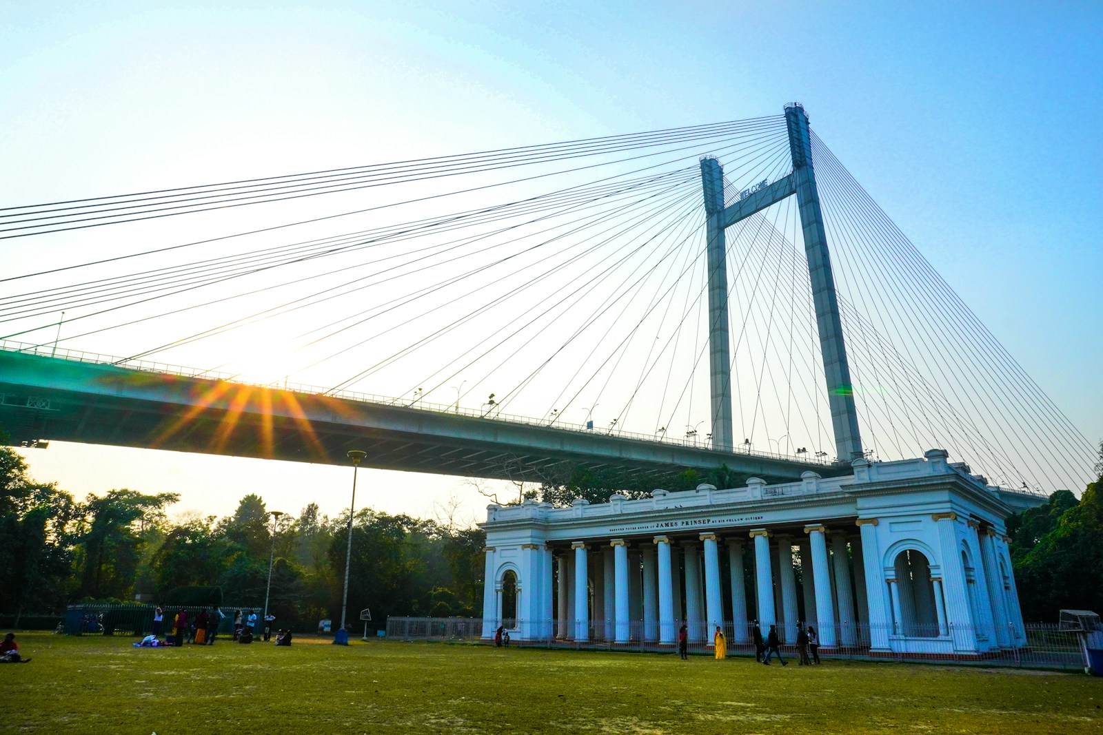 white and blue bridge under white sky during daytime